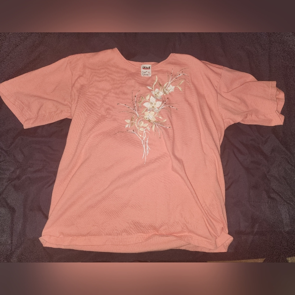 Anvil pink bouse L with sewn on floral on front.